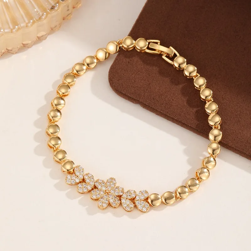 

Golden flower bracelet inlaid with zircon, light luxury, niche design, handmade fashion, versatile accessory