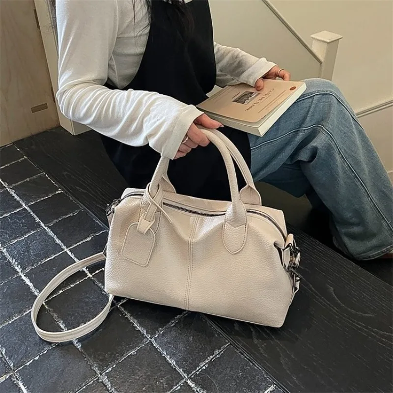ファッショナブルなレジャー用おむつバッグ、シンプルなヴィンテージハンドバッグ、高級ブランドのレザートートバッグ、レターロゴ付き、パーティーやショッピングに最適