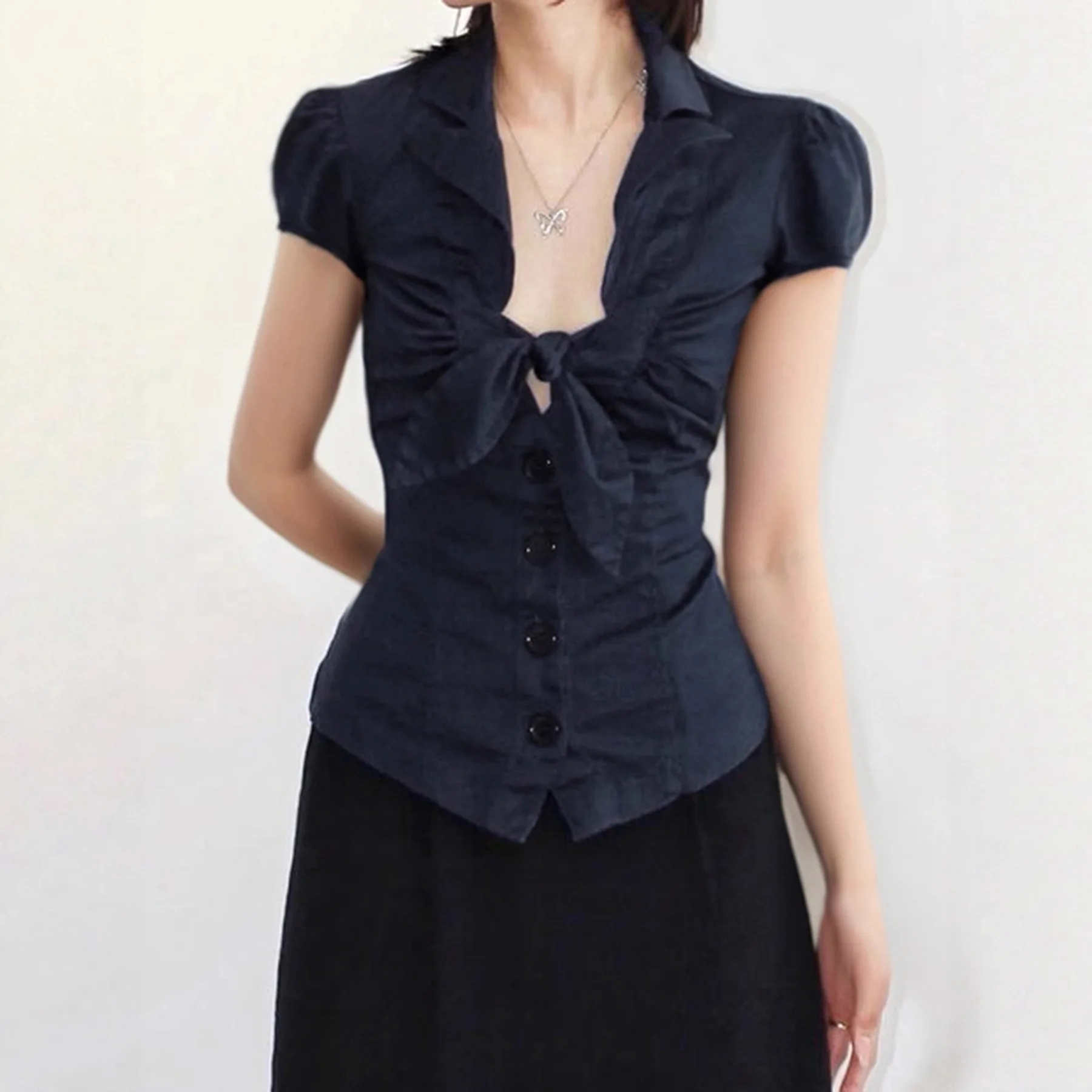 

European and American style bow tie bubble sleeve shirt top slim short-sleeved T-shirt with double-breasted flanging V-neck.