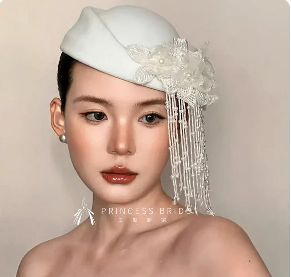 

Princess new bride retro elegant wedding dress small hat British headdress heavy handmade tassel antique cheongsam hat.