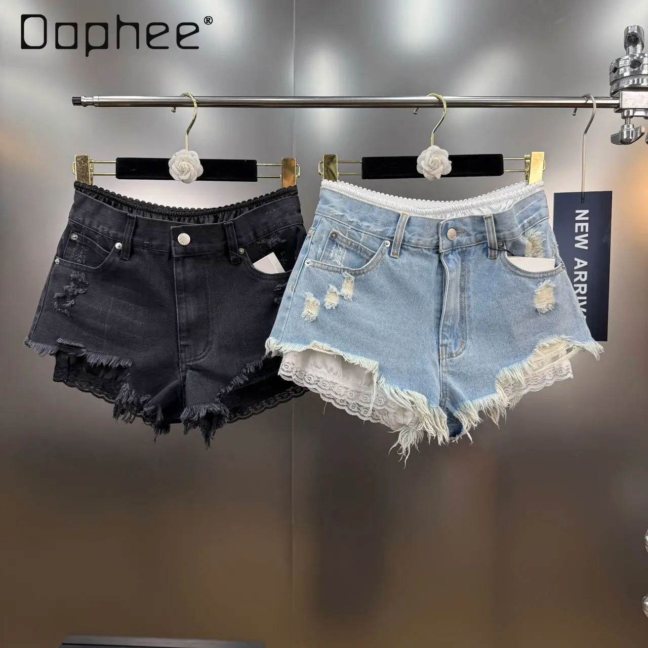 Estate 2025 Nuovo francese retrò pizzo splicing strappato bordo grezzo falso pantaloncini di jeans in due pezzi Spice Girl Y2K jeans slim a vita alta