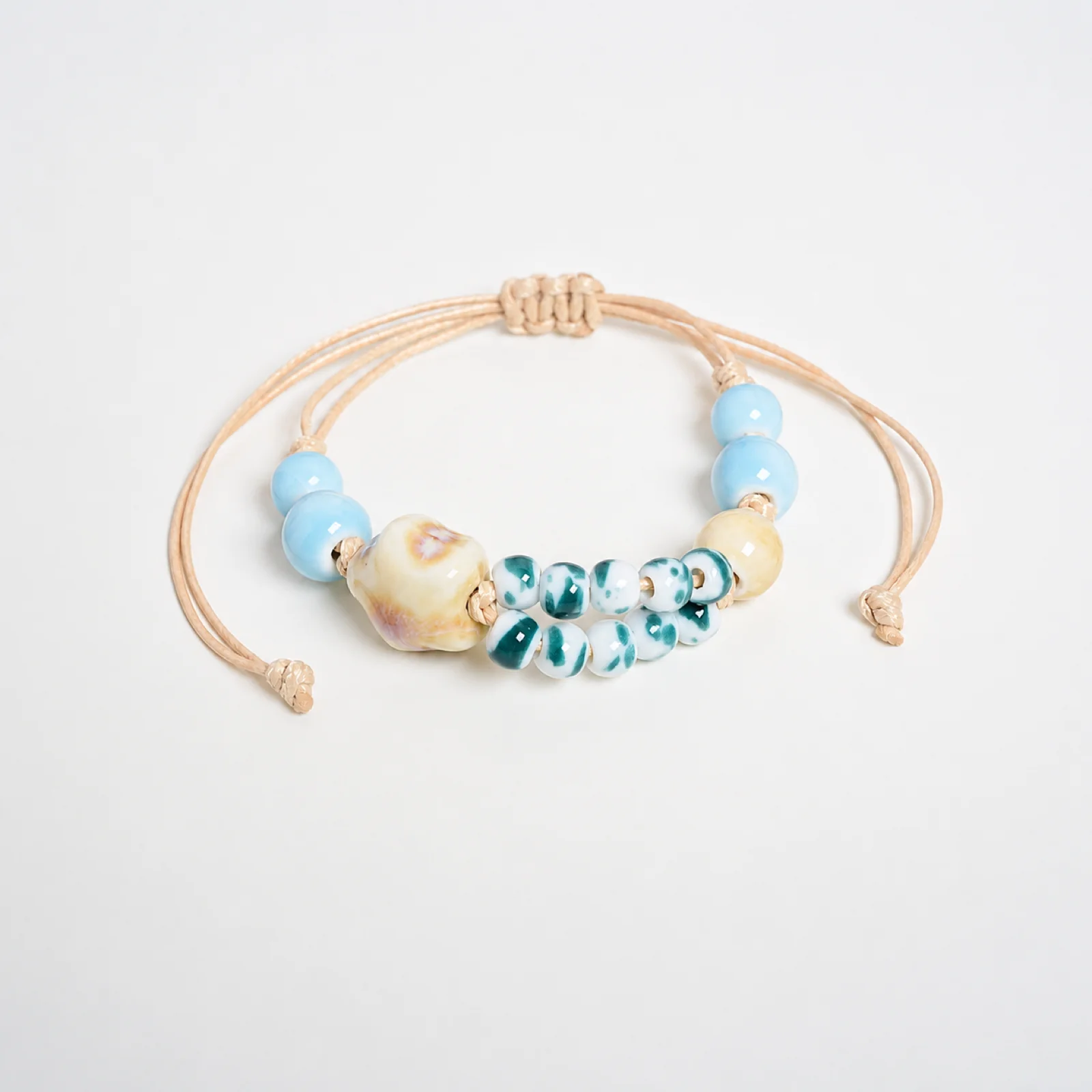 Handmade Ceramic Star Bead Bracelet Handwoven Wax Cord Adjustable Artisan Jewelry with Star Charm Accent 608P13-03