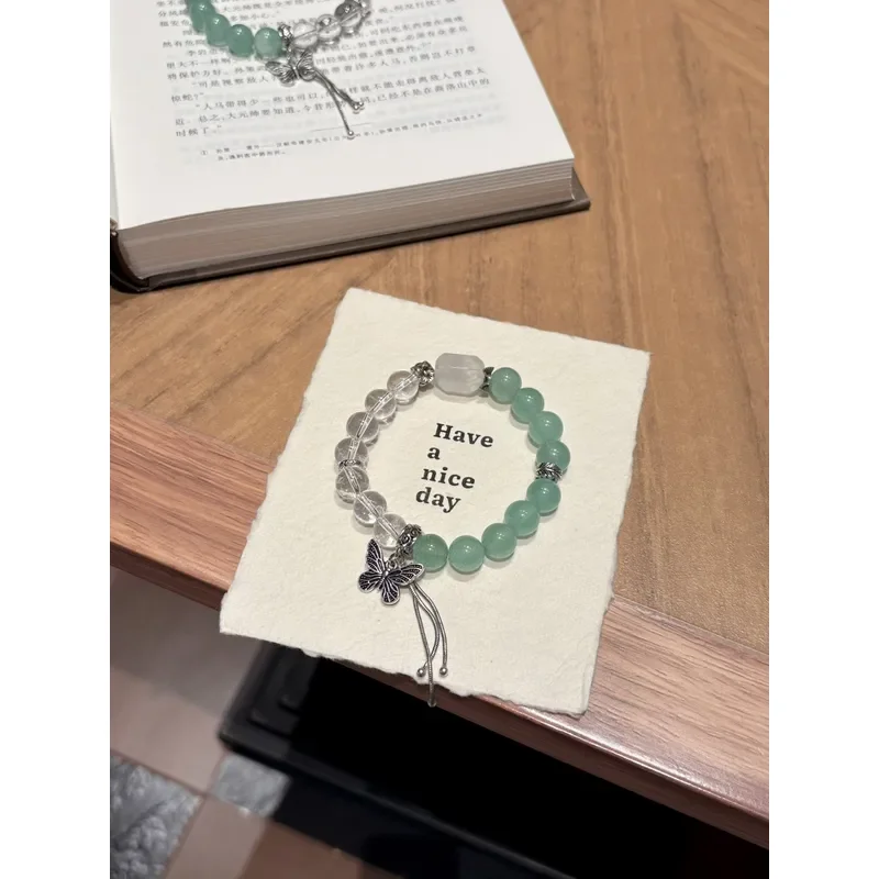 Original natural white crystal green strawberry crystal butterfly tassel retro cold crystal bracelet Ximu