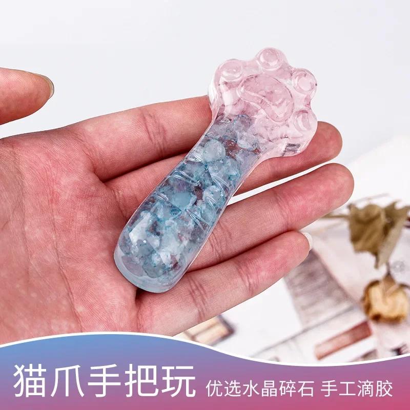 A handmade Epoxy Cat's Claw Ornament Obsidian Aquamarine Luminous Stone Pink Crystal Ornament Cute Wind