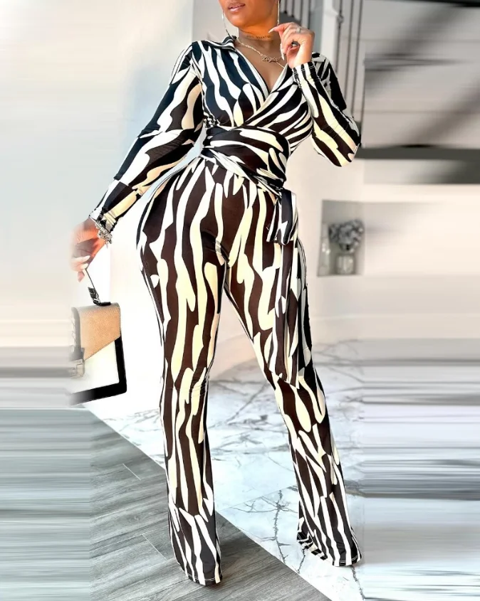 

Color blocked zebra striped printed V-neck long sleeved jumpsuit casual lace up detail wide leg jumpsuit for women in spring