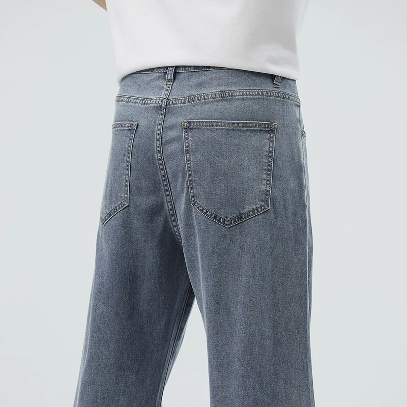 Calça jeans de tecido lyocell macia masculina, elástica fina, respirável, solta perna larga, calça jeans elástica na cintura, casual, verão