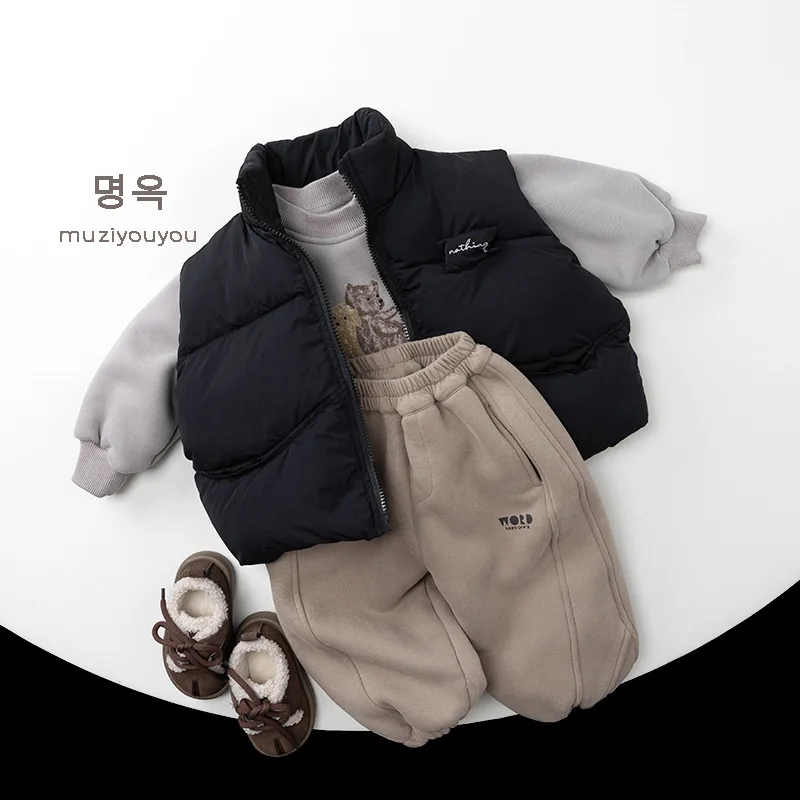 2025 شتاء جديد الأطفال سميكة الدافئة سترة الفتيان الفتيات القطن وسادة مبطنة موضة الطفل معطف بلا أكمام الاطفال جاكيت زيبرا