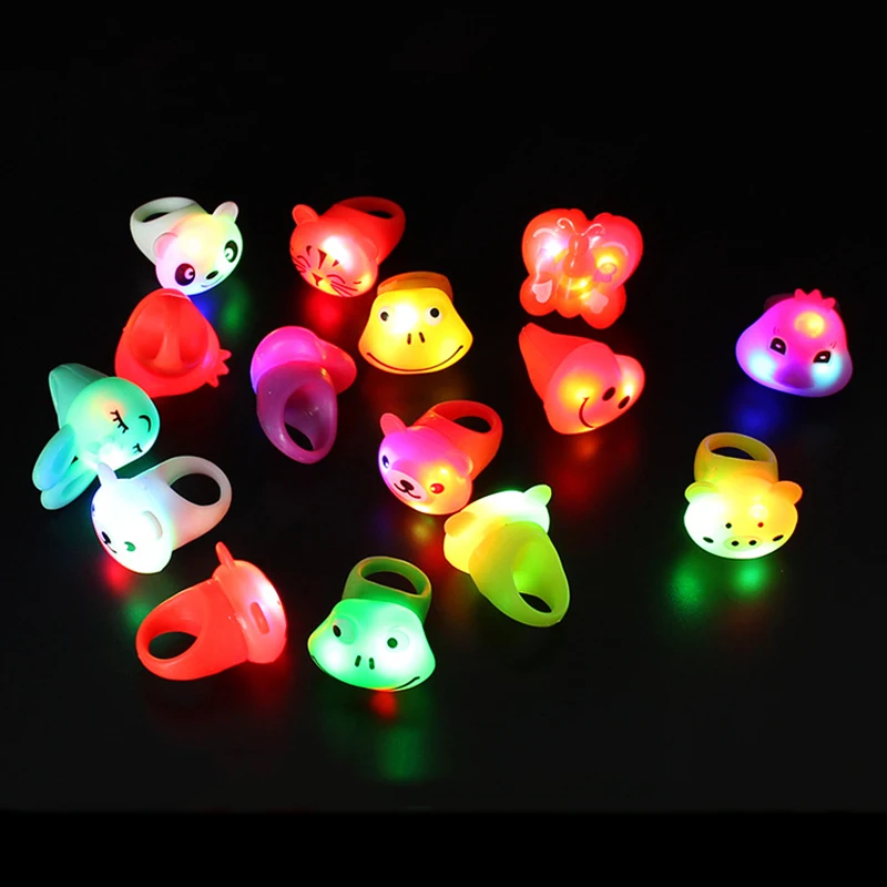 Anel emissor de luz LED de borracha macia para crianças, brinquedos dos desenhos animados, brilho criativo, suprimentos para festas, 2 peças