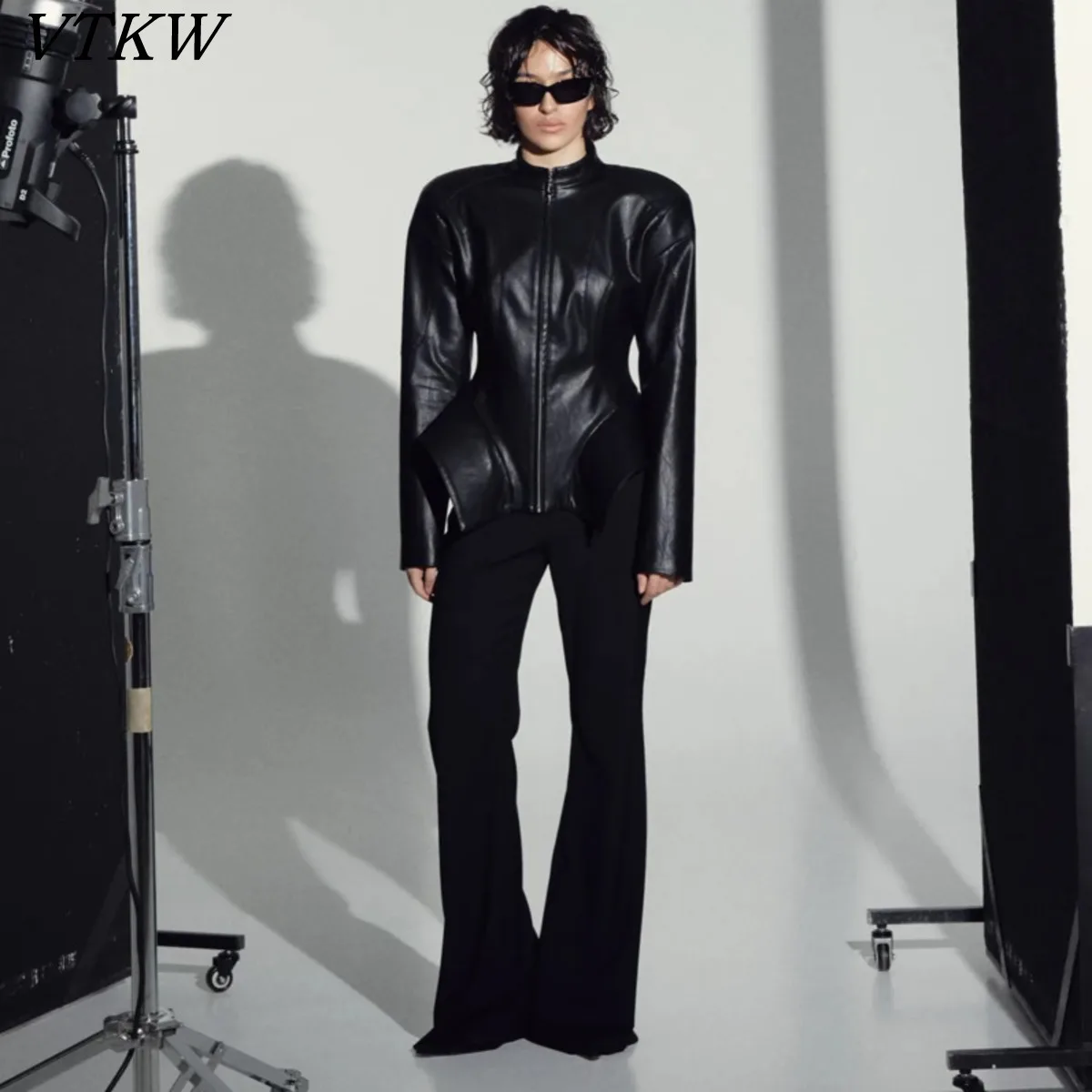 

VTKW 2026 New Women Fashion Faux Leather Jacket Stand Collar Zipper Slim Fit Peplum Hem Elegant Casual Chic Outerwear