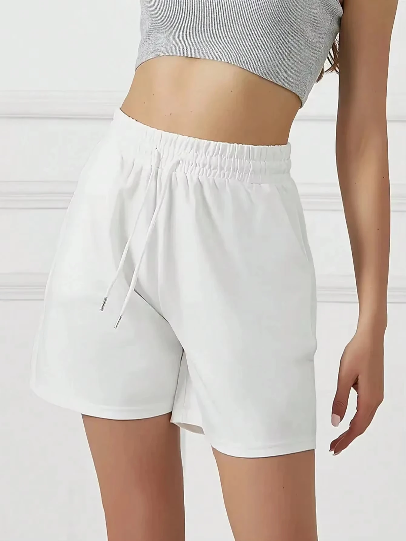 شورت كاجوال بلون موحد مع رباط وخصر مطاطي شورت للجري واللياقة البدنية للنساء ملابس نسائية لجميع المواسم
