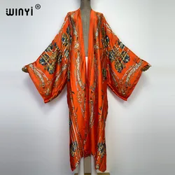 WINYI nowe błyszczące modne drukowanie słodka dama plaża czeski długi kardigan Cover-up stitch Casual Boho Maxi przyjęcie świąteczne kimono