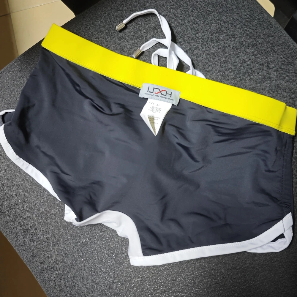 .Cross-border men's color matching boxer swimming trunks with cup three-dimensional simple boxer swimming trunks beachUXH246-1