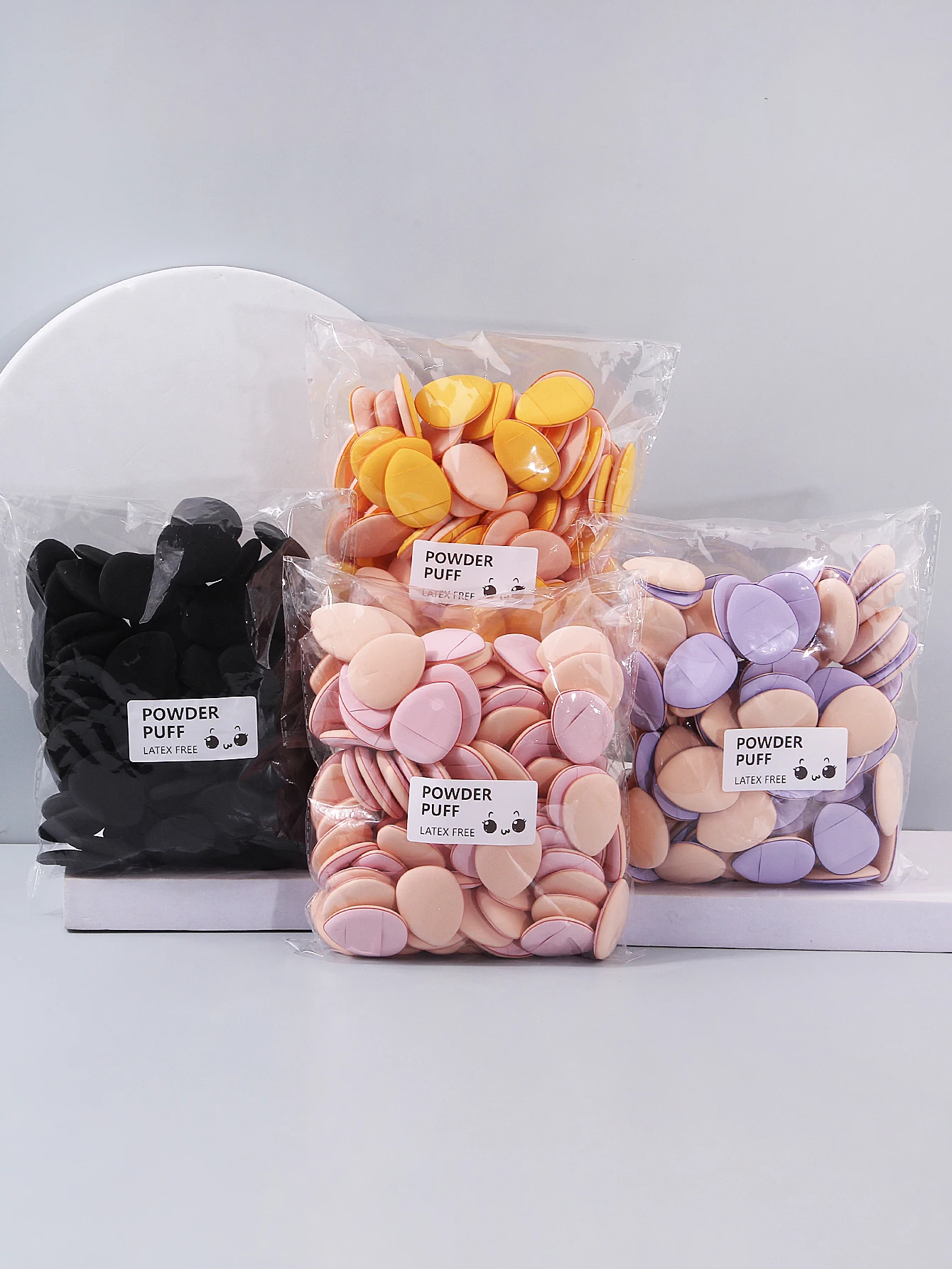 Nouveau 100 pièces Mini bouffées de poudre de doigt éponge douce Non absorbante de poudre double usage pour fond de teint correcteur maquillage Portable tactiles