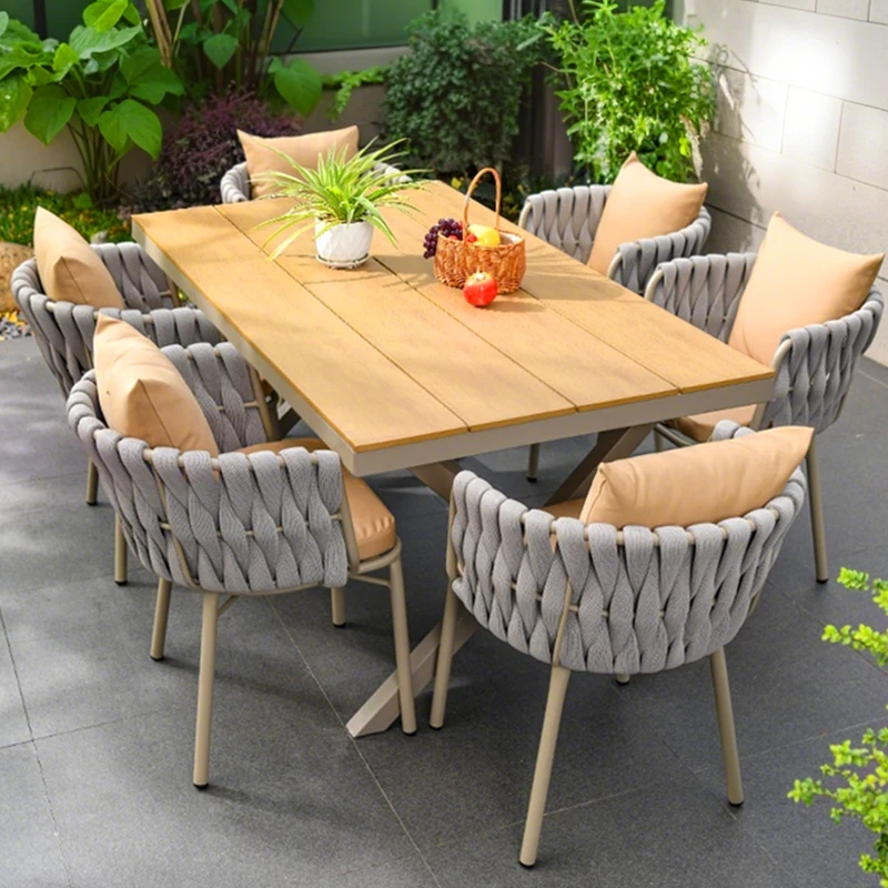 

Outdoor plastic wood tables and chairs Nordic leisure courtyard garden villa yard simple rattan aluminum alloy table and chair c