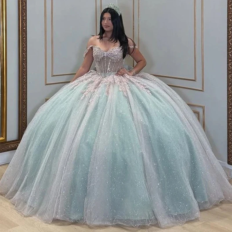 

Элегантное платье Quinceneara из органзы с вышивкой и блестками Золушка без рукавов с вырезом лодочкой по индивидуальному заказу с бантом для выпускного вечера Vestido De Noche