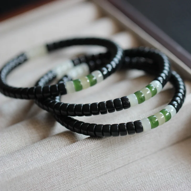 

Hetian Duobao Dark Jade Tablet Bracelet