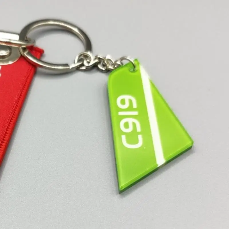 1 قطعة كلا الجانبين طباعة الاكريليك نمط الطيران العمودي الذيل علامة السيارة مفتاح الملحقات الطيران المفاتيح حقيبة الظهر قلادة