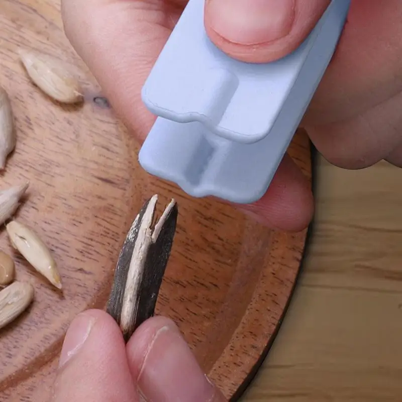 

Manual Melon Sunflower Seed Peeler Machine Pine Nut Melon Seed Artifact Opener Kitchen Household Tool Shelling Clip Kitchen Tool