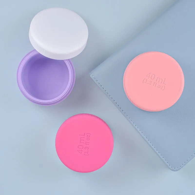 40 ml tragbare Silikon-Reisegläser mit Deckel, Toilettenartikel, Reisebehälter, nachfüllbarer Make-up-Behälter, Gesichtscreme, Creme, Puderetui
