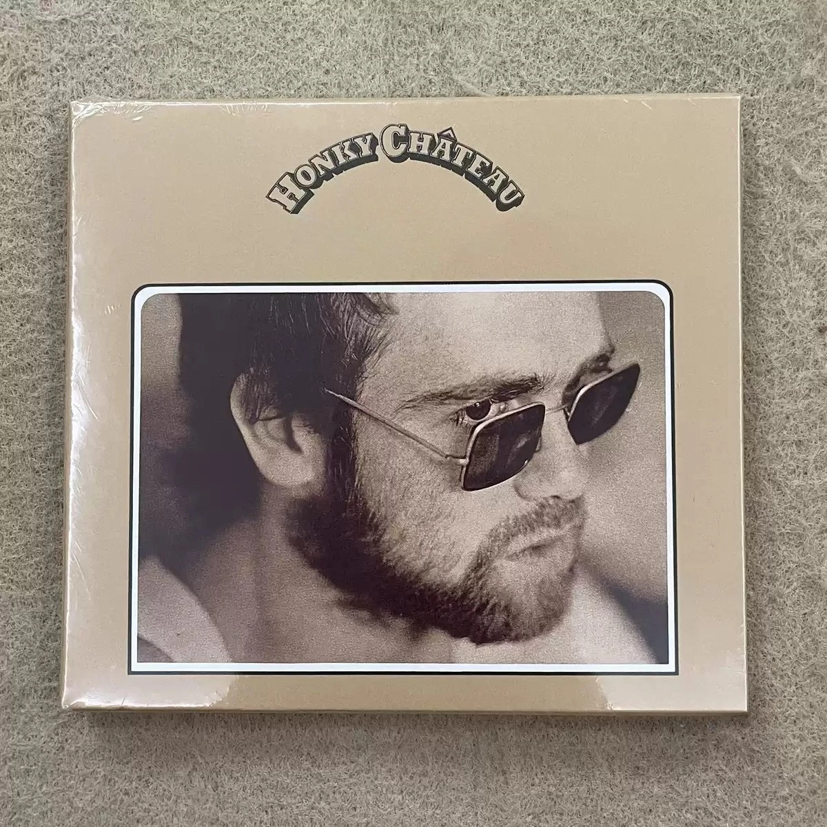 

Vintage 70s Soft Rock CD Simple Khaki Outer Cover with Framed Sepia Portrait Premium Collectible Disc for Classic Pop Rock Fans