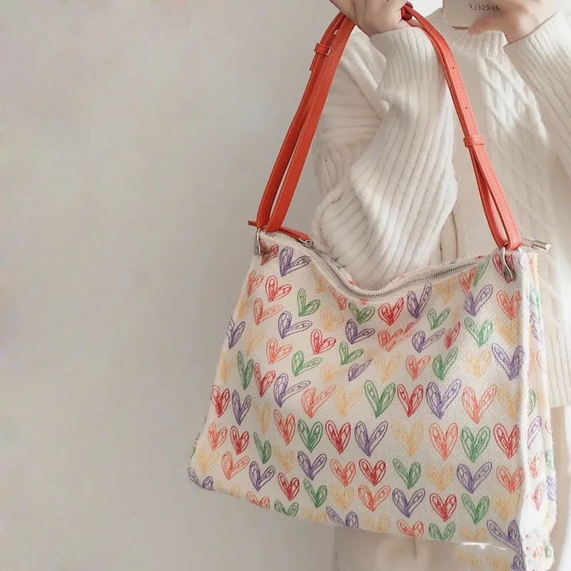 2023 NEW Canvas Shoulder Bag Large Capacity Tote Bag Candy Color Heart-Shaped Printed Crossbody Bag Student Commute Storage Bag