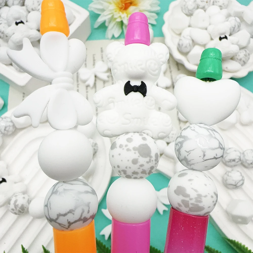 35PCS white bow bear silicone bead set, perfect for DIY handmade crafts such as keychains, necklaces, bracelets, etc