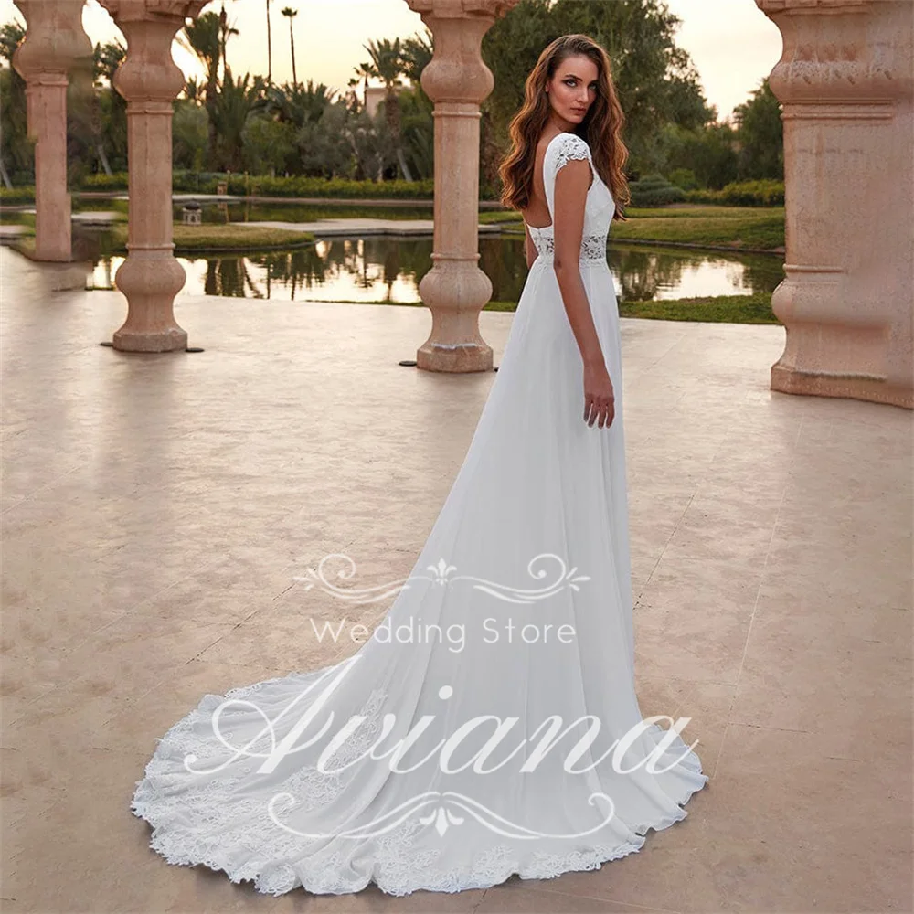 Aviana Maßgeschneidertes Brautkleid in A-Linie mit O-Ausschnitt, Spitzenapplikationen, Stickerei, Sweep-Zug, kurze Ärmel, bodenlang, rückenfrei, Morden