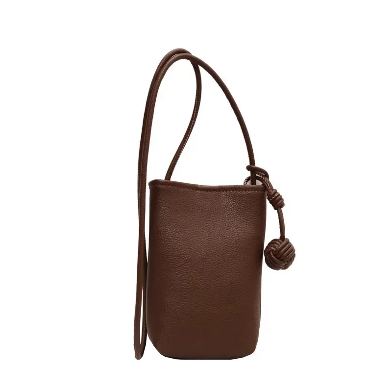 Versatile artistic small fresh small round ball pendant crossbody phone bag, soft leather cute mini bag for women view 5