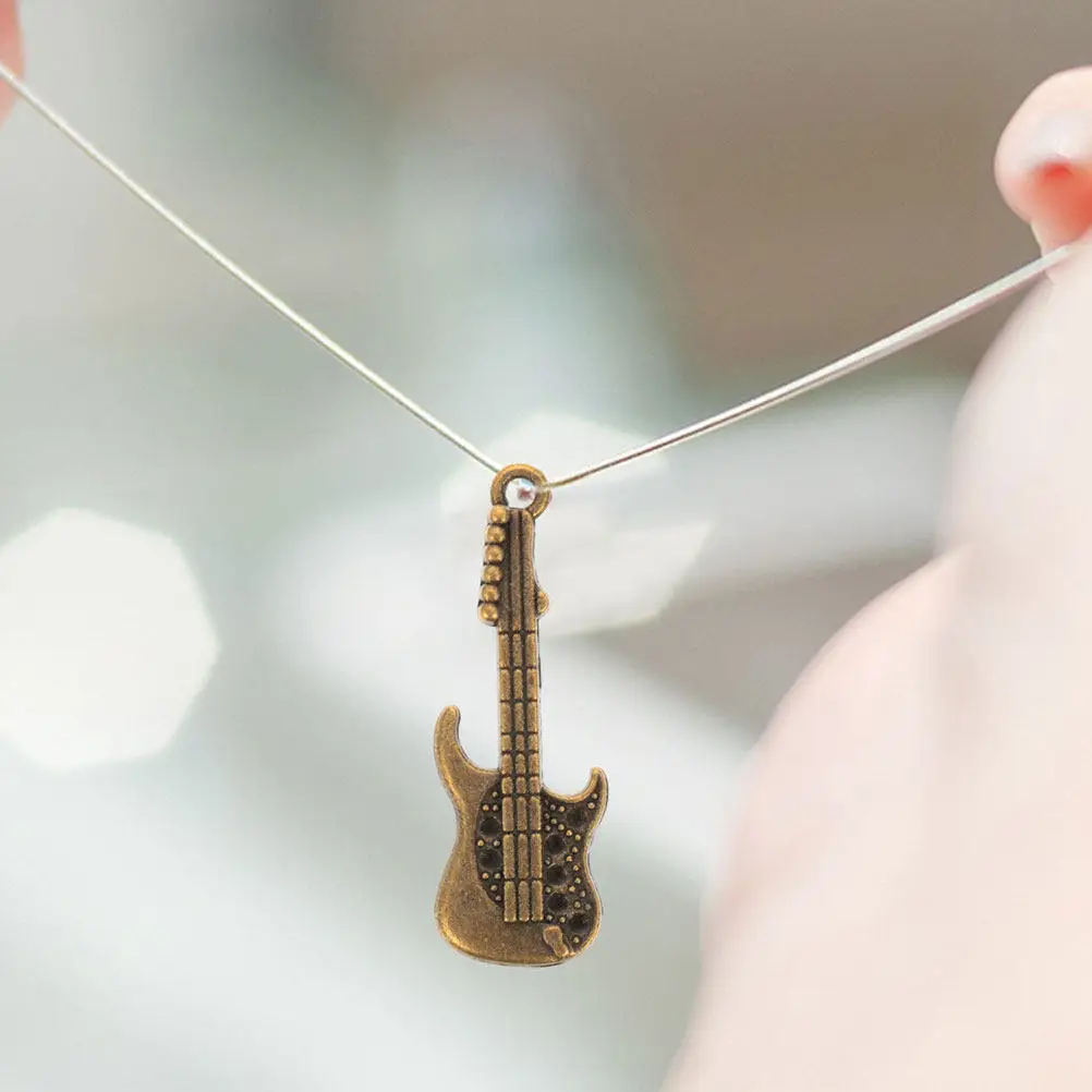 

100Pcs Metal Guitar Charms Phone Cover Decor Miniature Guitar Pendant Zinc Alloy DIY Craft Ornament Phone Shell Charm