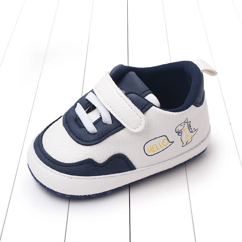 Scarpe per bambini di nuovo stile più vendute primaverili e autunnali per camminatori di apprendimento di dinosauri per bambini comodi con fondo morbido da 0-18 mesi
