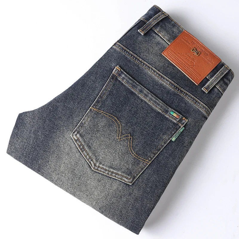 Nostalgia Jeans pria Retro lurus Slim-Fit High-End dicuci kasual tertekan Fashion merek bisnis jalan celana panjang