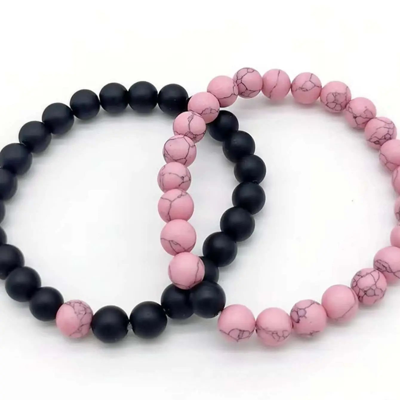 2 pairs of pink beads with black beads bracelet set