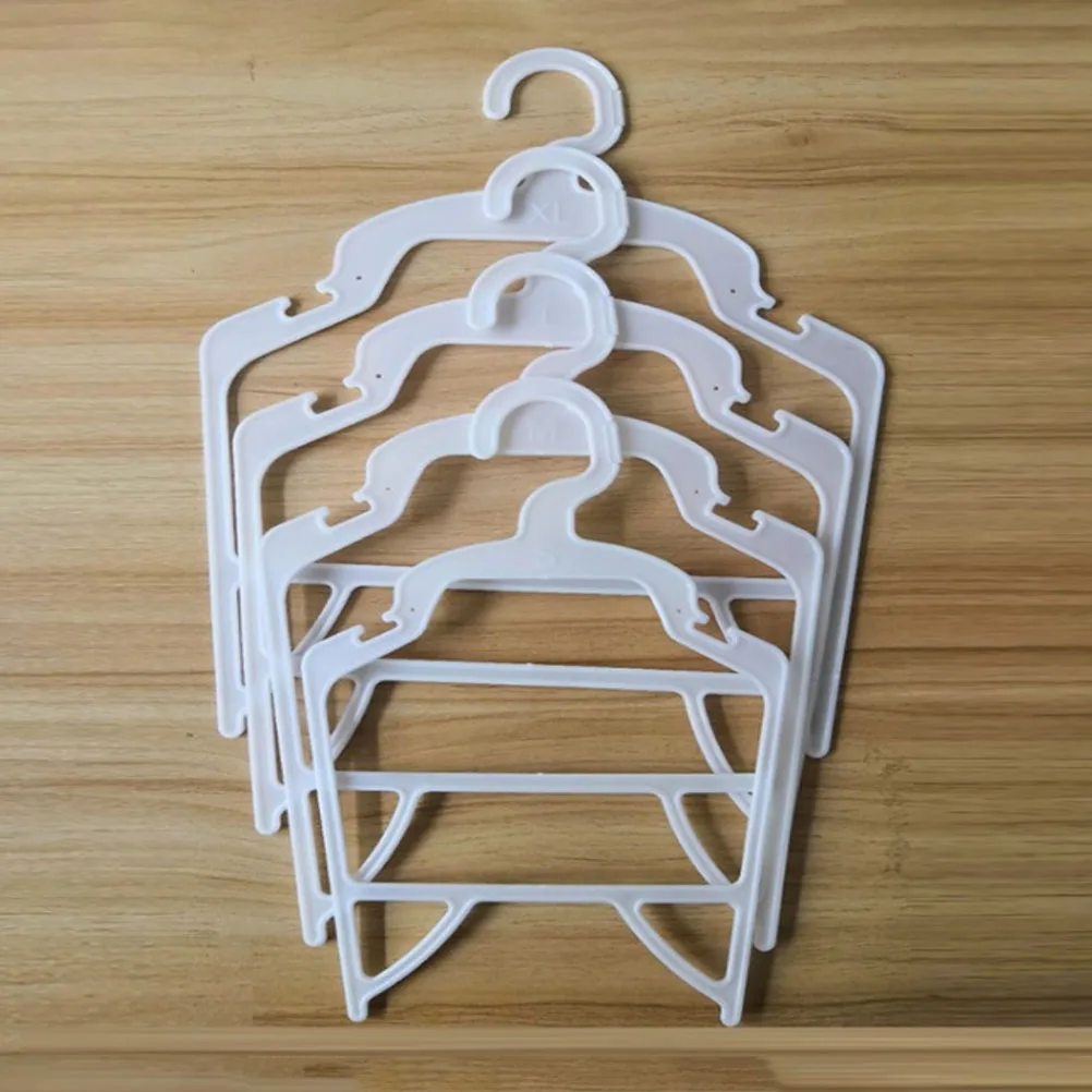 

15Pcs Pet Clothes Hangers Heavy Duty Plastic Dog Costume Hangers Space Saving Compact Design for Travel Dorm Kitchen Bathroom