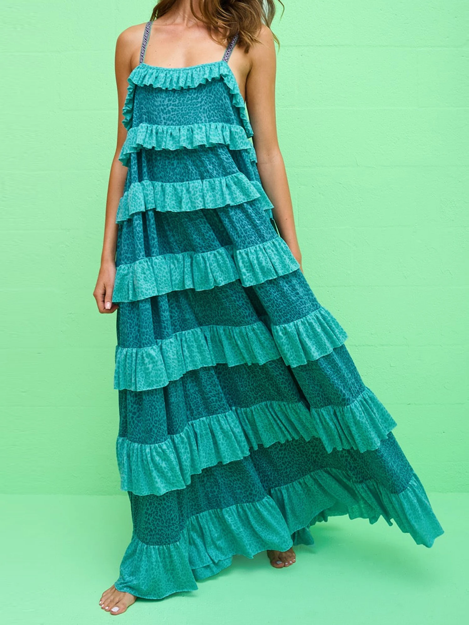 Vestido maxi elegante sem mangas com decote em V e babados fluidos em camadas, perfeito para festas e eventos de verão