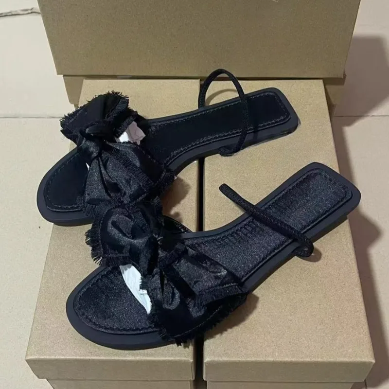 

Flat Bottom Women Beach Sandals Fashion Tassel Bow Elastic Band Concise Design 2025 Summer Footwear Walking Travel Ladies Shoes
