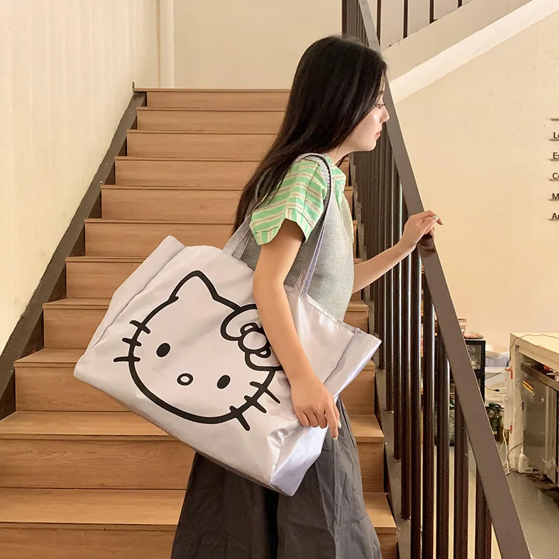 

Sanrio Hellokitty Extra large capacity kitty laser cute cathead environmentally friendly travel bag big handbag trendy bag