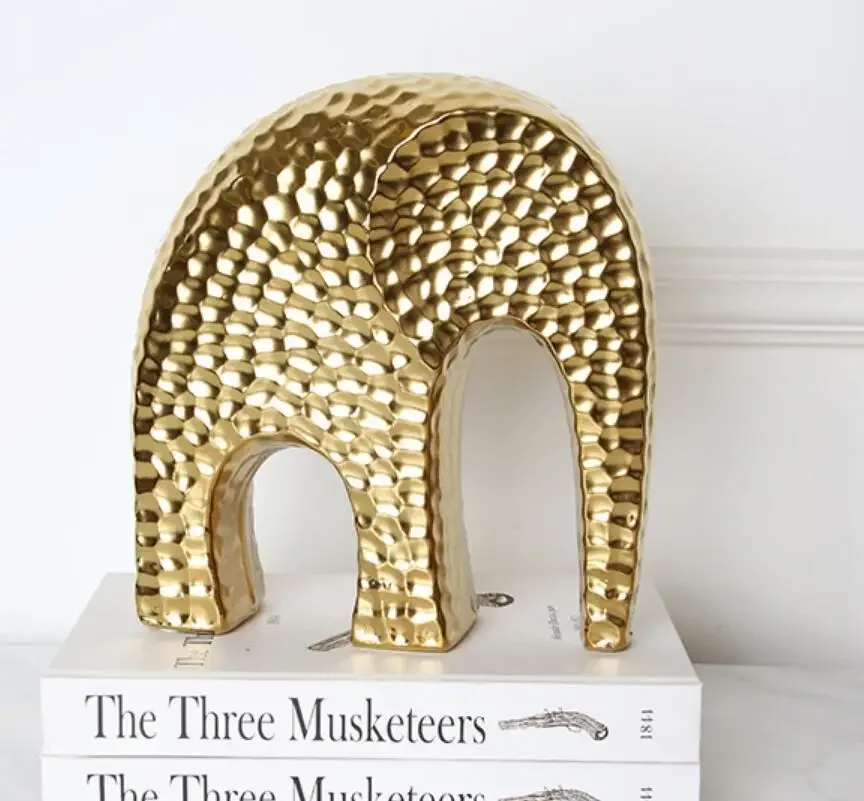 

-Middle Eastern Style Golden Ceramic Elephant Ornament
