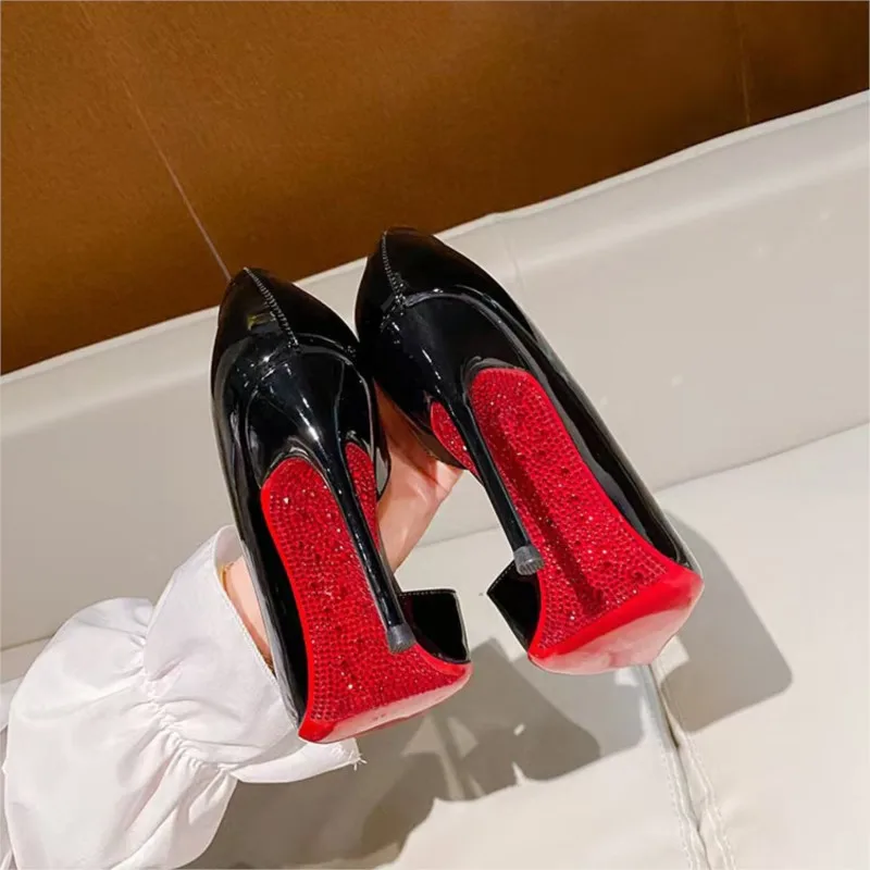 2025 Black patent leather side empty large size red sole high heels women's advanced sense pointy thin heel shallow single shoes