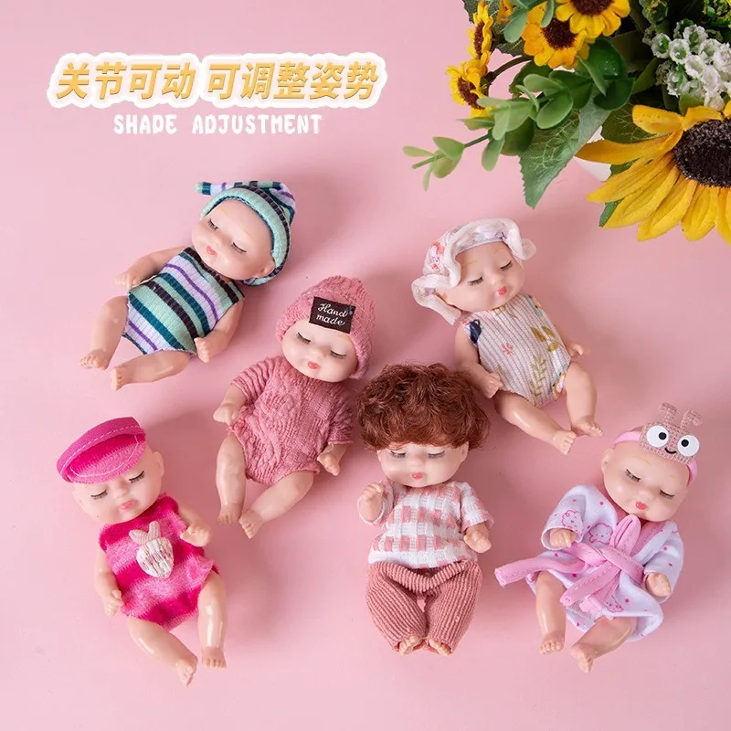 لعبة دمية محاكاة صغيرة لطيفة للنوم مع ملابس وإكسسوارات مفاصل دمية صغيرة متحركة هدية عيد ميلاد للأطفال.