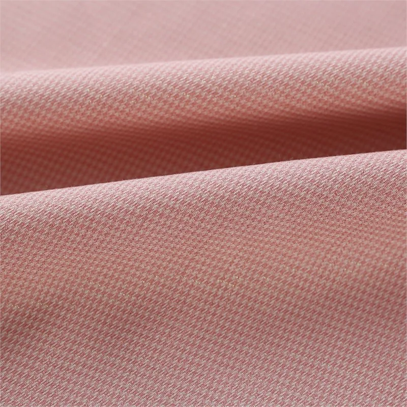 The fabric of small suit dyed coat trousers and skirt