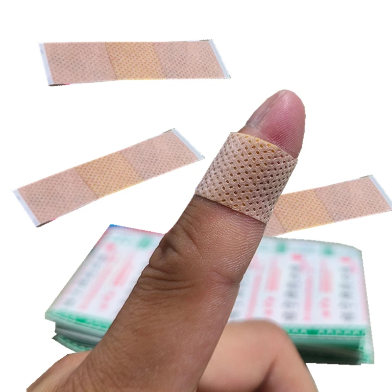 

50pcs/set Emergency First Aid Band Aid Nonwovens Plasters Breathable Wound Dressing Patch Tape Adhesive Bandages Woundplast