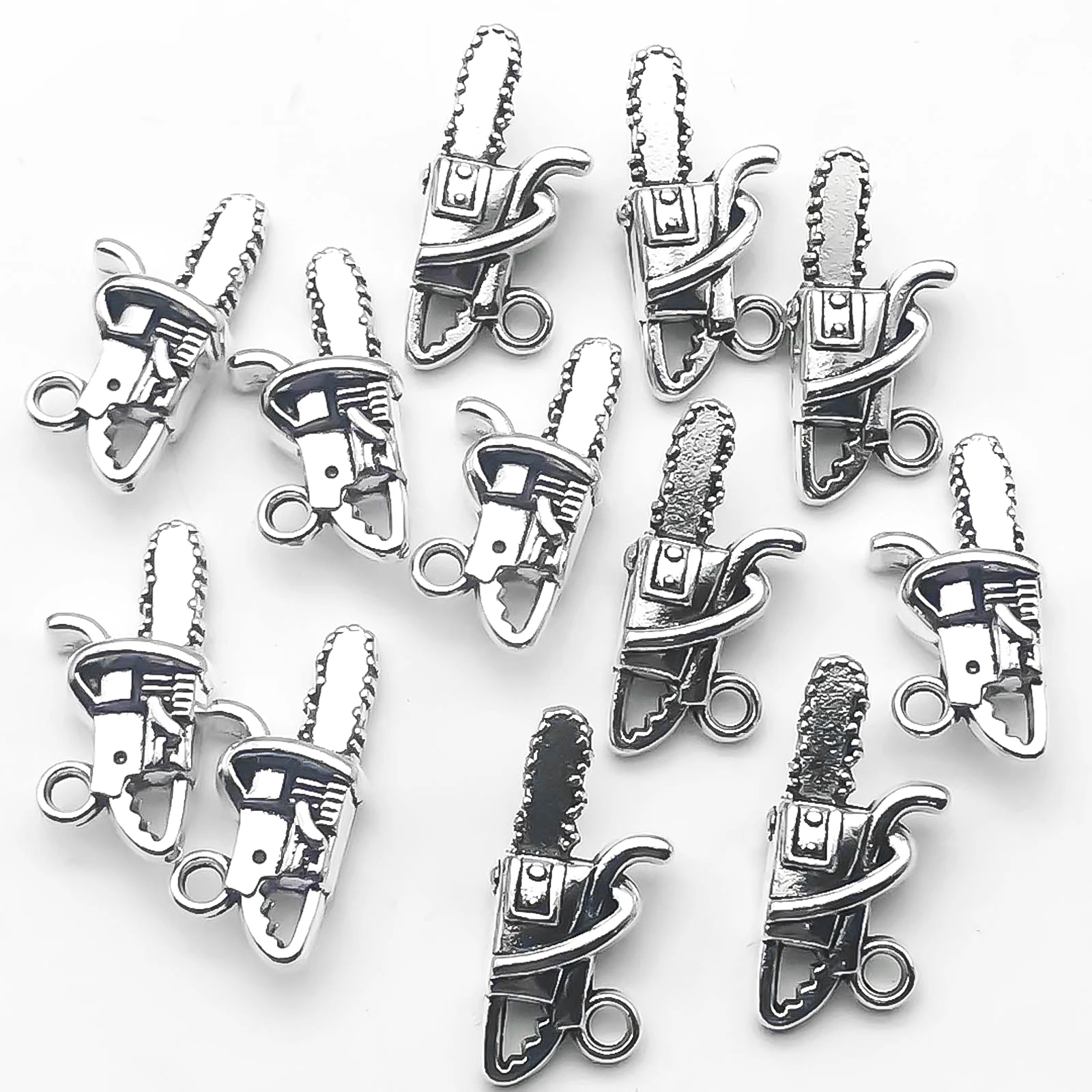 20Pcs Alloy Antique Silvery Chainsaw Pattern Charms Set