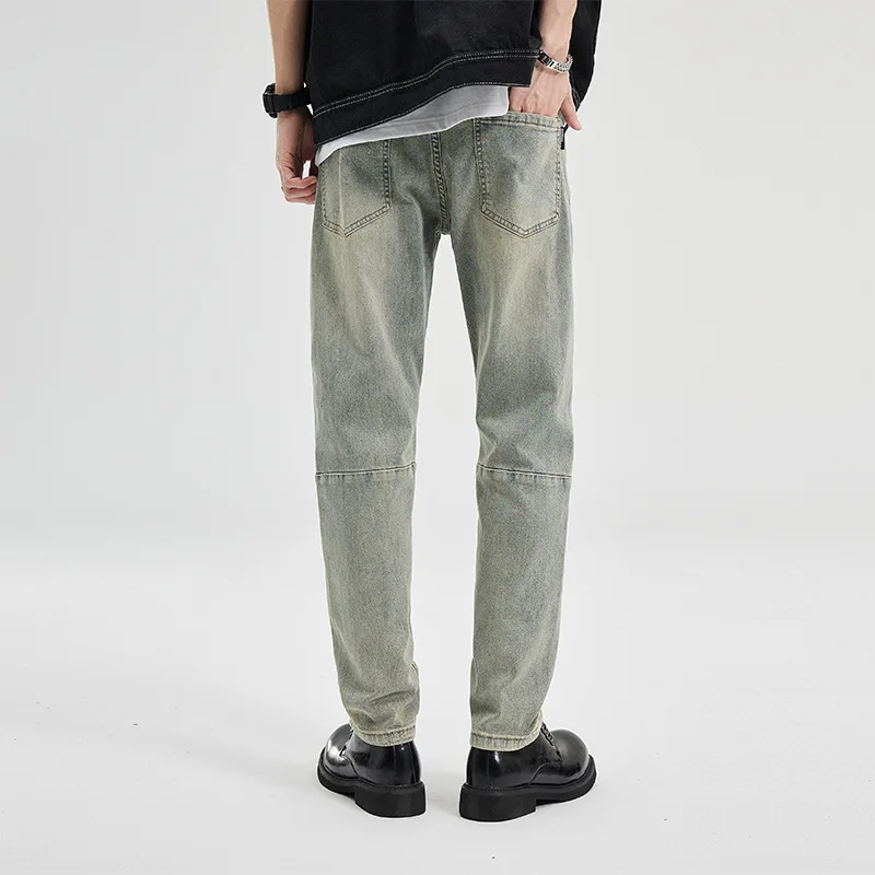 アメリカンウォッシュ加工のヴィンテージ風メンズジーンズ、フィット感があり、ややテーパード、ストレッチ入り