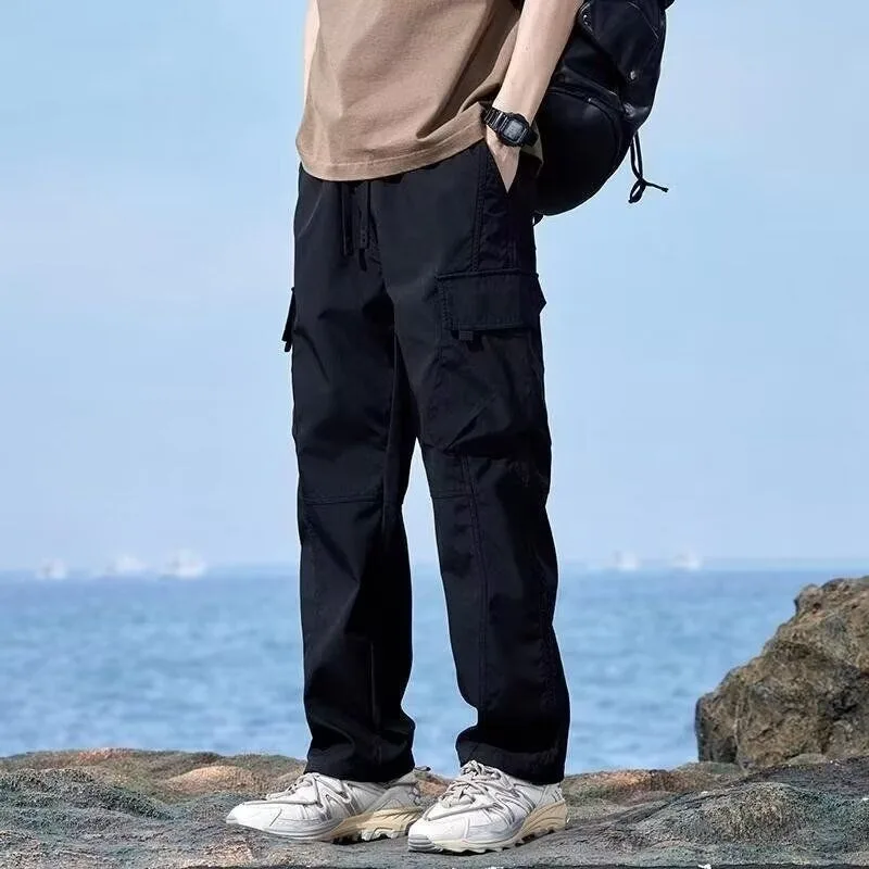 

Мужские черные брюки-карго с завязками на талии, с множеством карманов, свободного кроя, повседневные, для активного отдыха, удобные, модные.