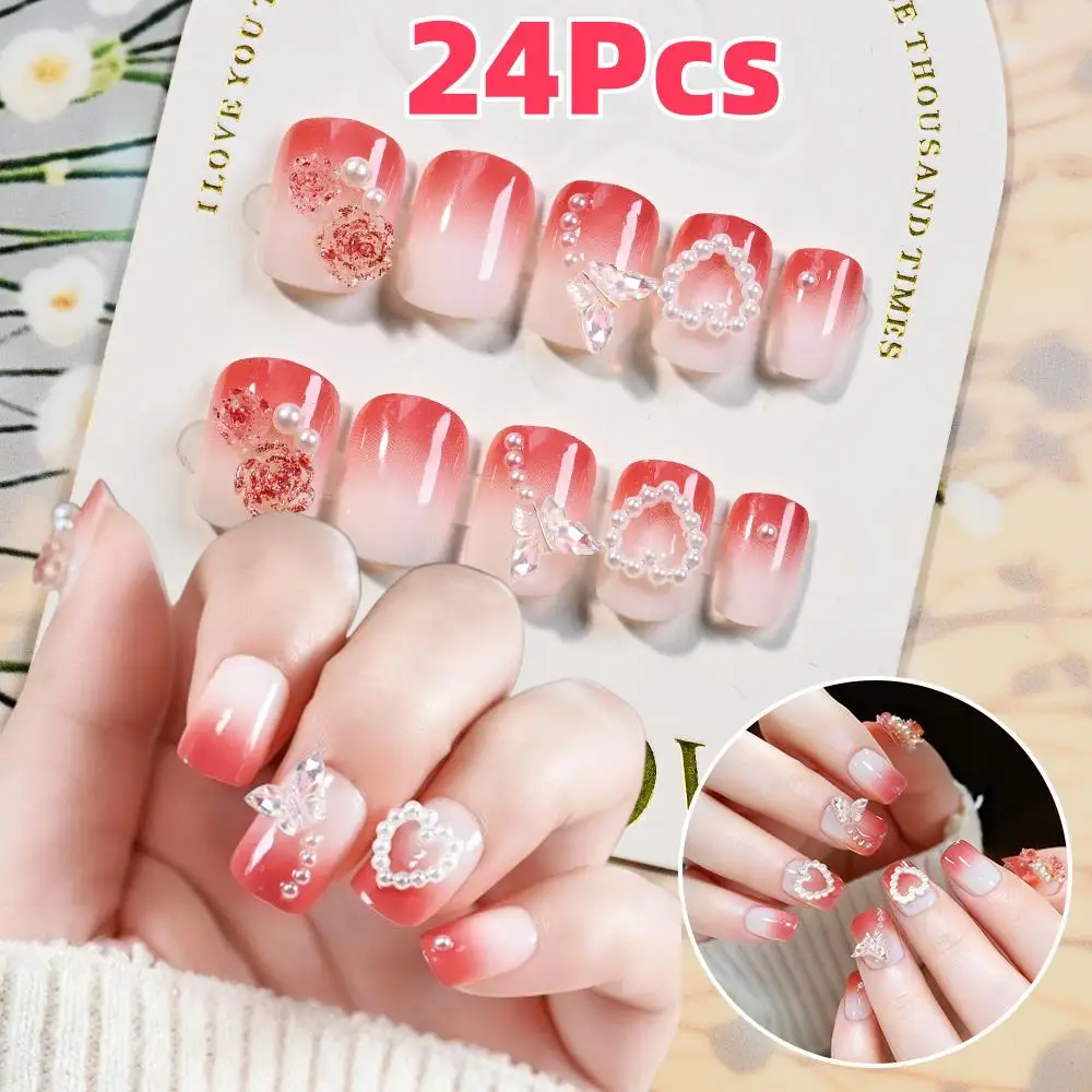 24 قطعة أظافر صناعية مربعة قصيرة متدرجة حمراء مع أحجار الراين على شكل فراشة ثلاثية الأبعاد اضغط على أطراف أصابع كاذبة لعيد الحب TD