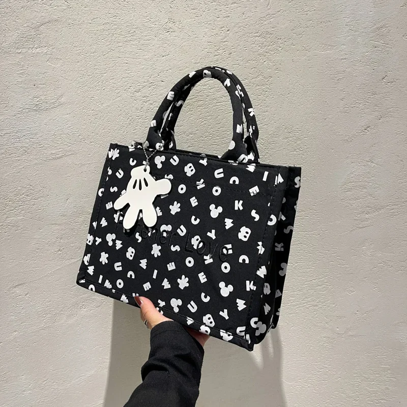 2024 New Disney Mickey borsa da donna Cartoon Cute Ladies borsa a tracolla borsa da viaggio di moda di marca di lusso di grande capacità