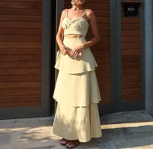 

2025 Season New Solid Color Sleeveless Backless Camisole Top with Lotus Leaf Long Skirt Set