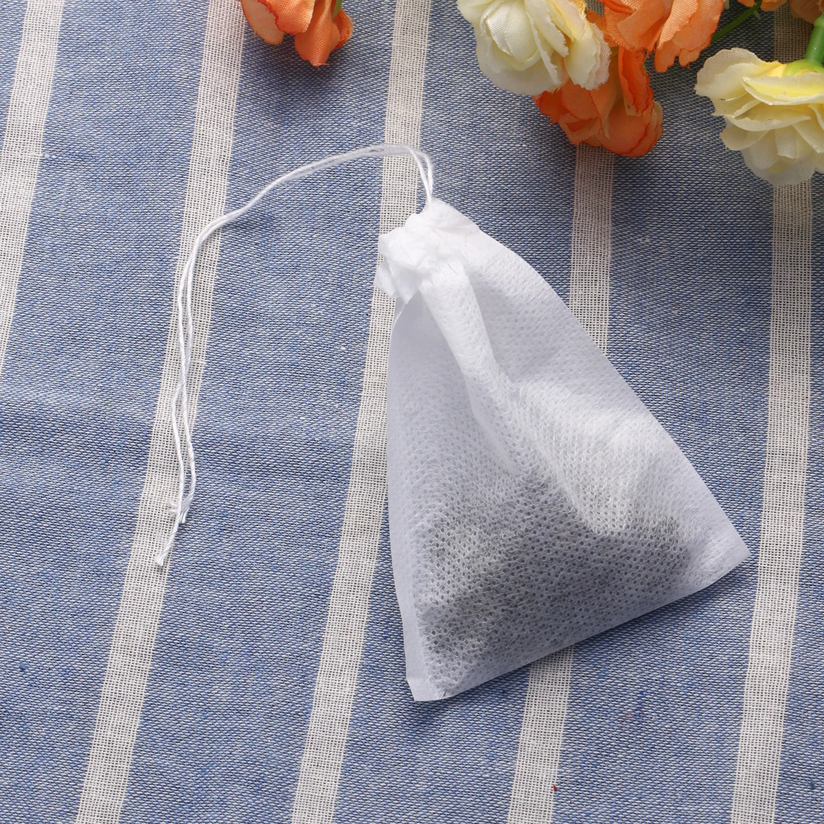 

100Pcs Drawstring Filter Non-Woven Tea Bags 70x90mm Empty Bags for Loose Leaf Coffee Herbal Powder Empty Bag for Loose Leaf Tea