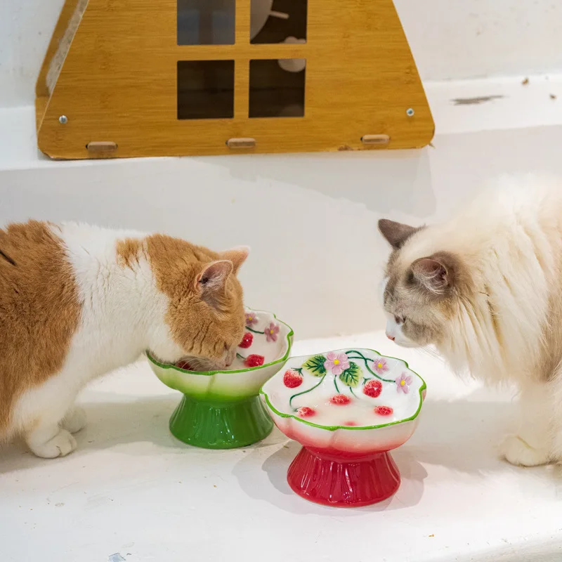 Pet ceramic strawberry slow food bowl with high foot design anti choking anti overturning cervical protection slow food bowl