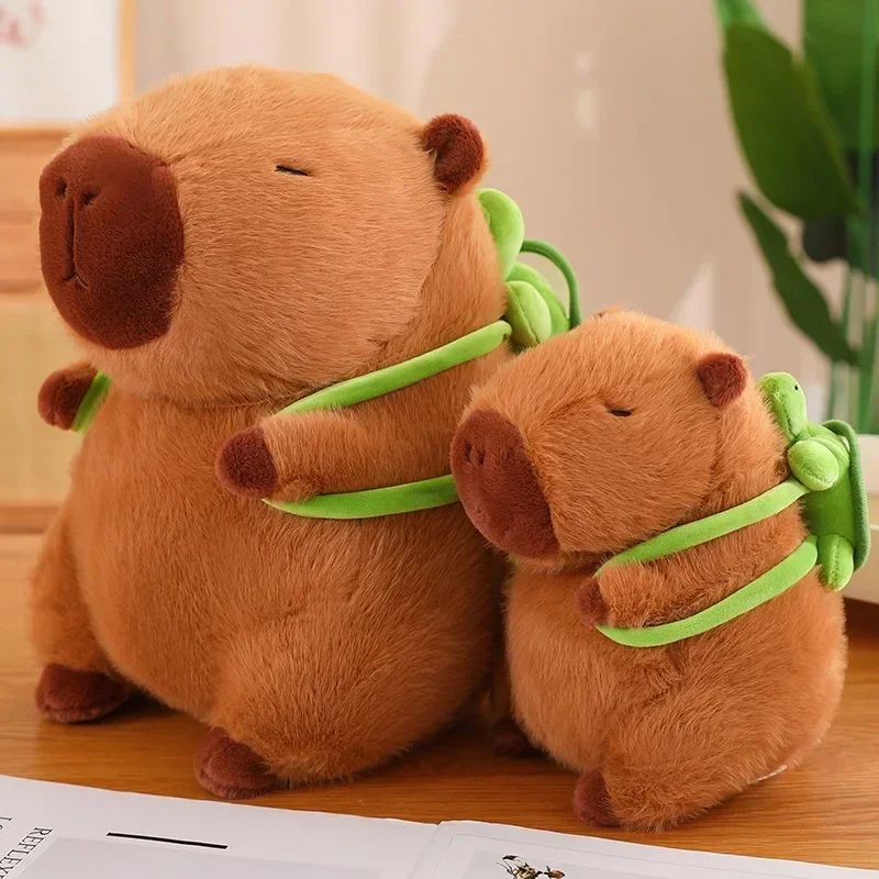 @ Peluche animaux en peluche poupée douce enfants jouets cadeau d'anniversaire pendentif décor mignon tortue sac à dos Capibara fraise chapeau Capybara